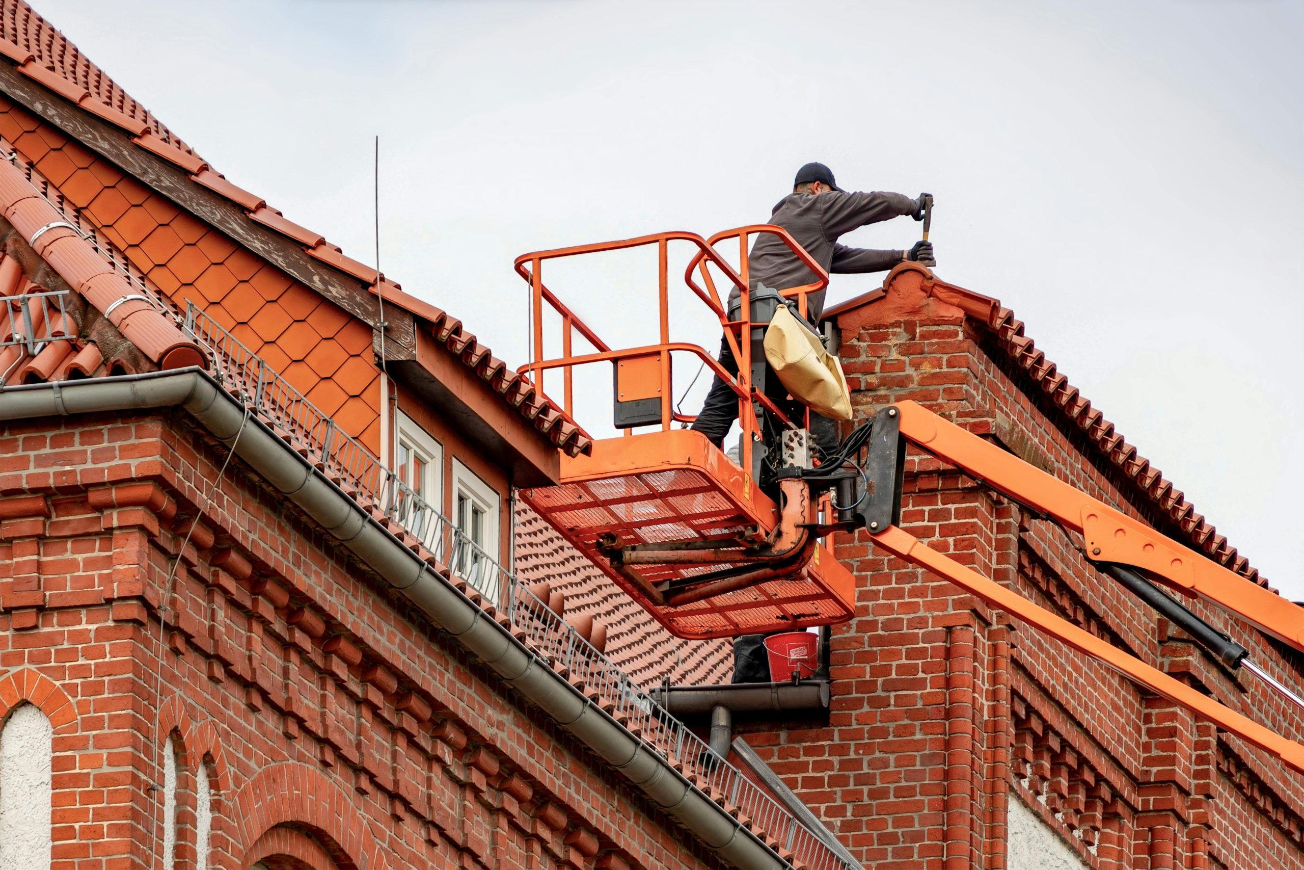 roofer-working-orpington Roofer working on a domestic roof in Orpington